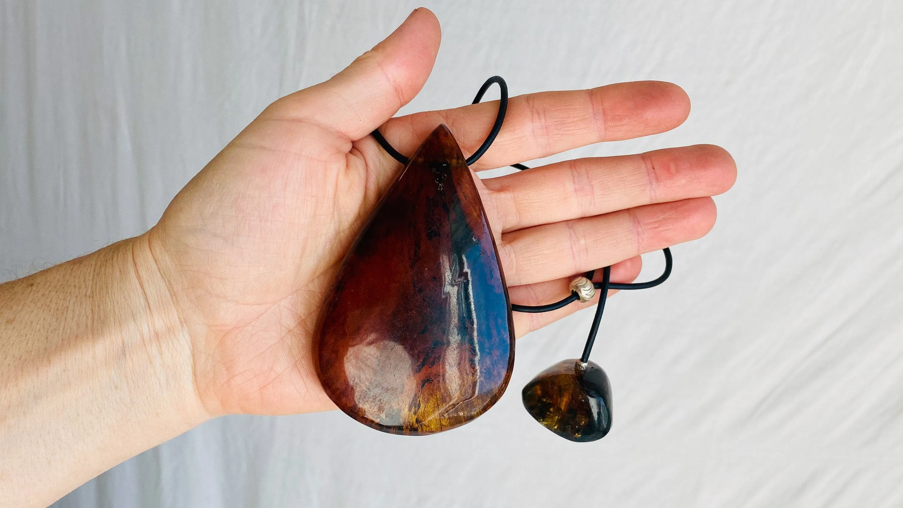 Large Amber Pendant on a Leather Cord. 0126