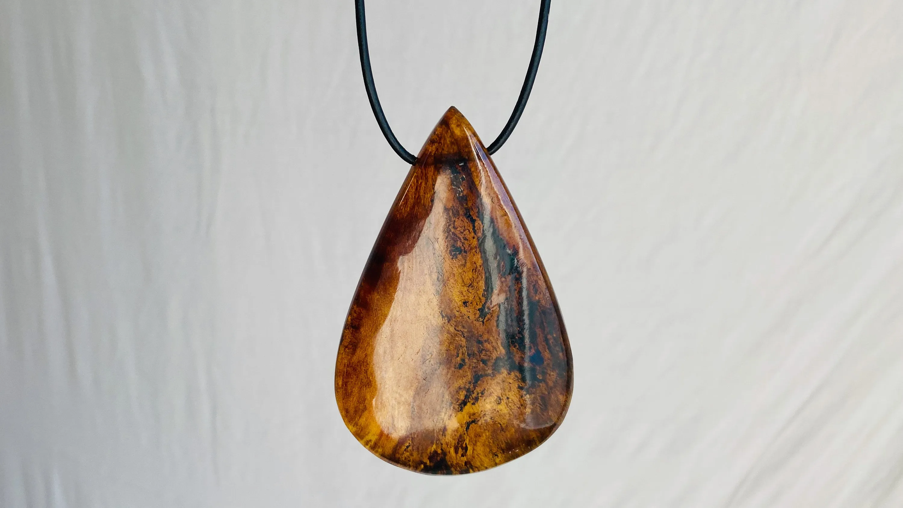 Large Amber Pendant on a Leather Cord. 0126