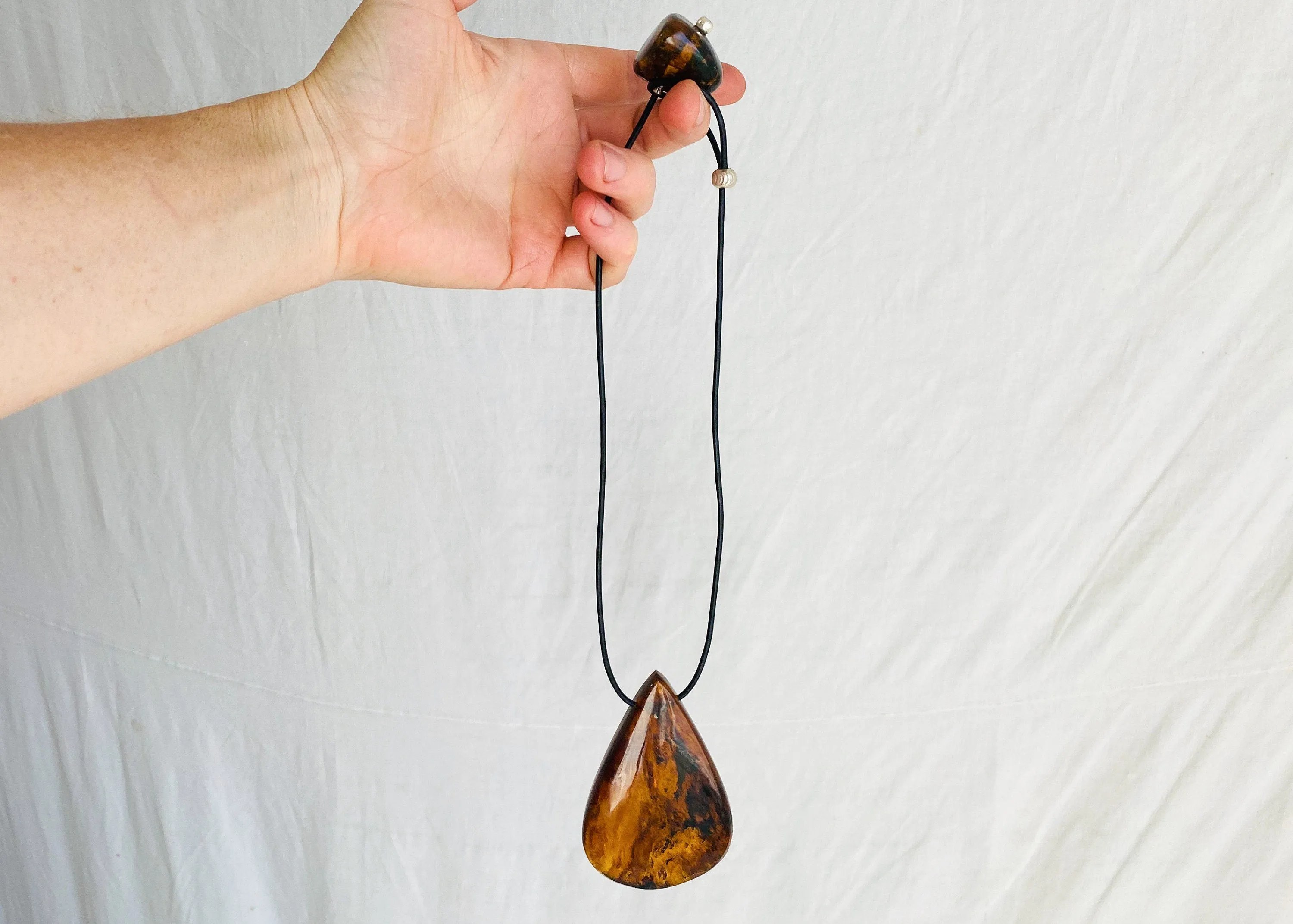 Large Amber Pendant on a Leather Cord. 0126