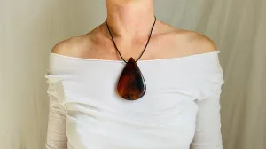 Large Amber Pendant on a Leather Cord. 0126