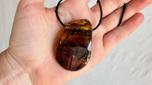Large Amber Pendant on a Leather Cord. 1173