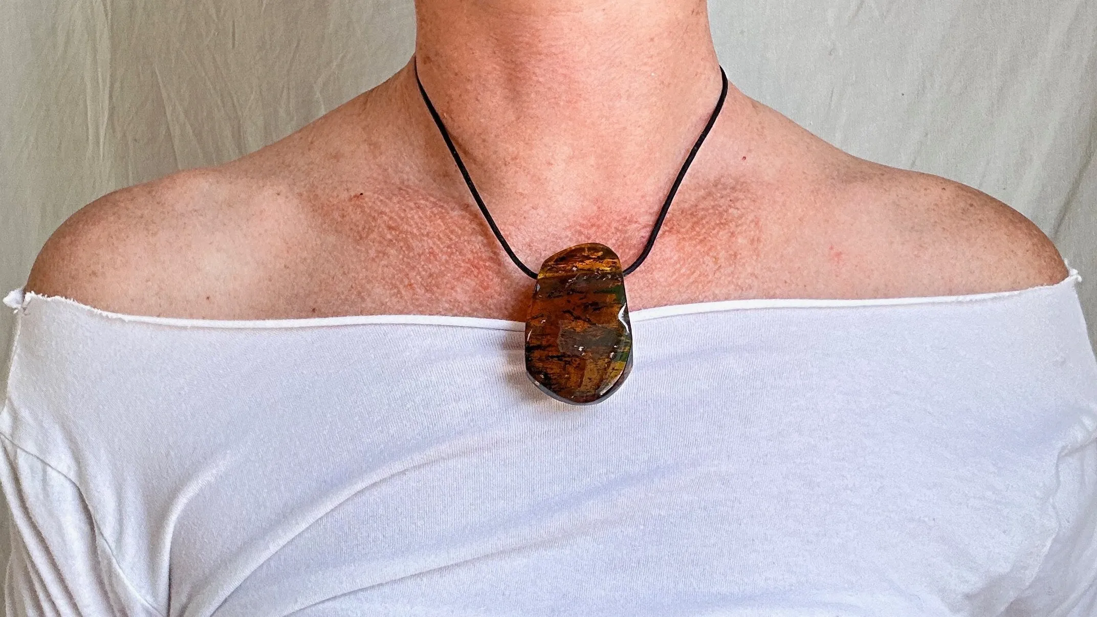 Large Amber Pendant on a Leather Cord. 1173