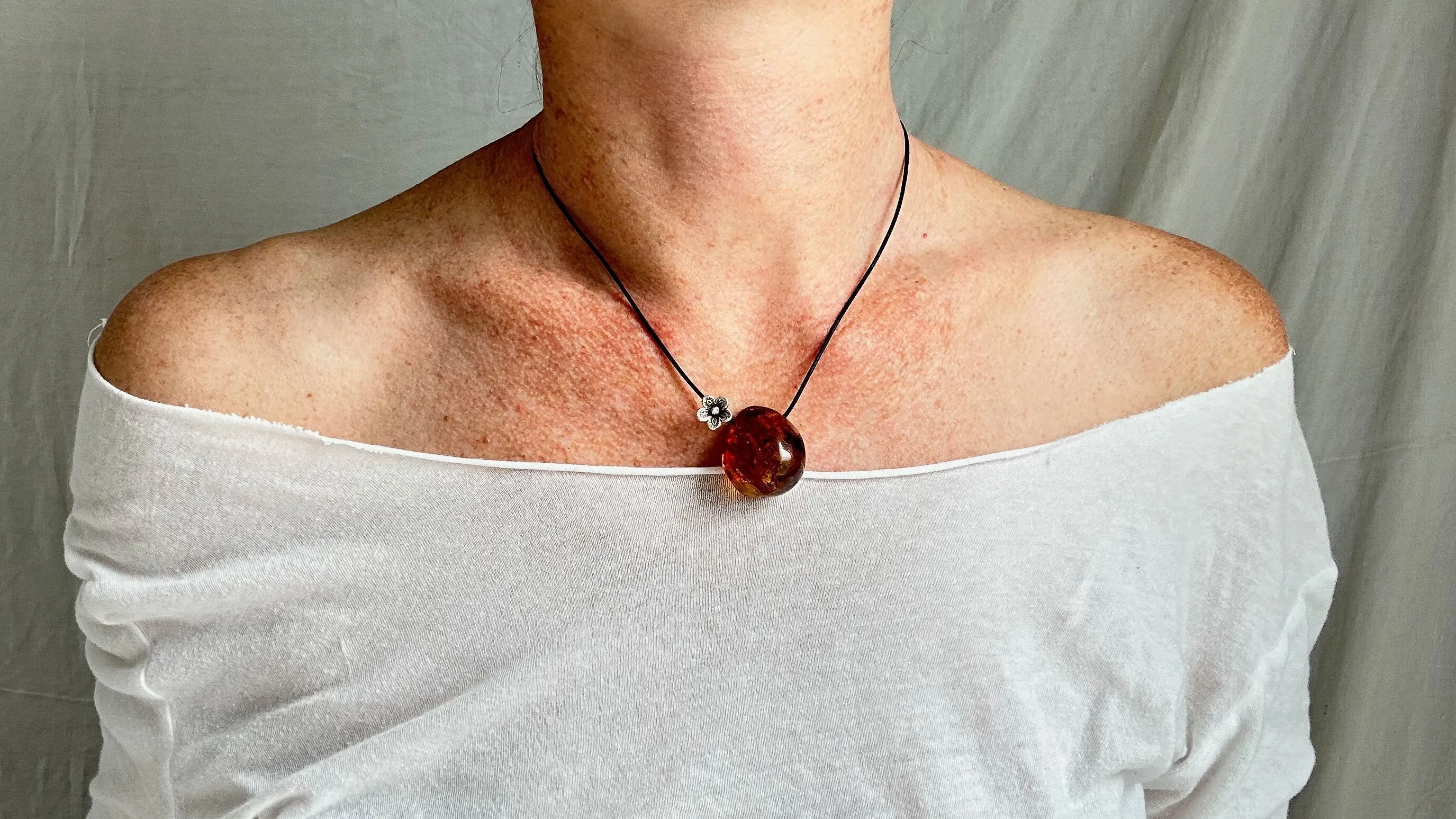 Large Amber Pendant on a Leather Cord. 1426