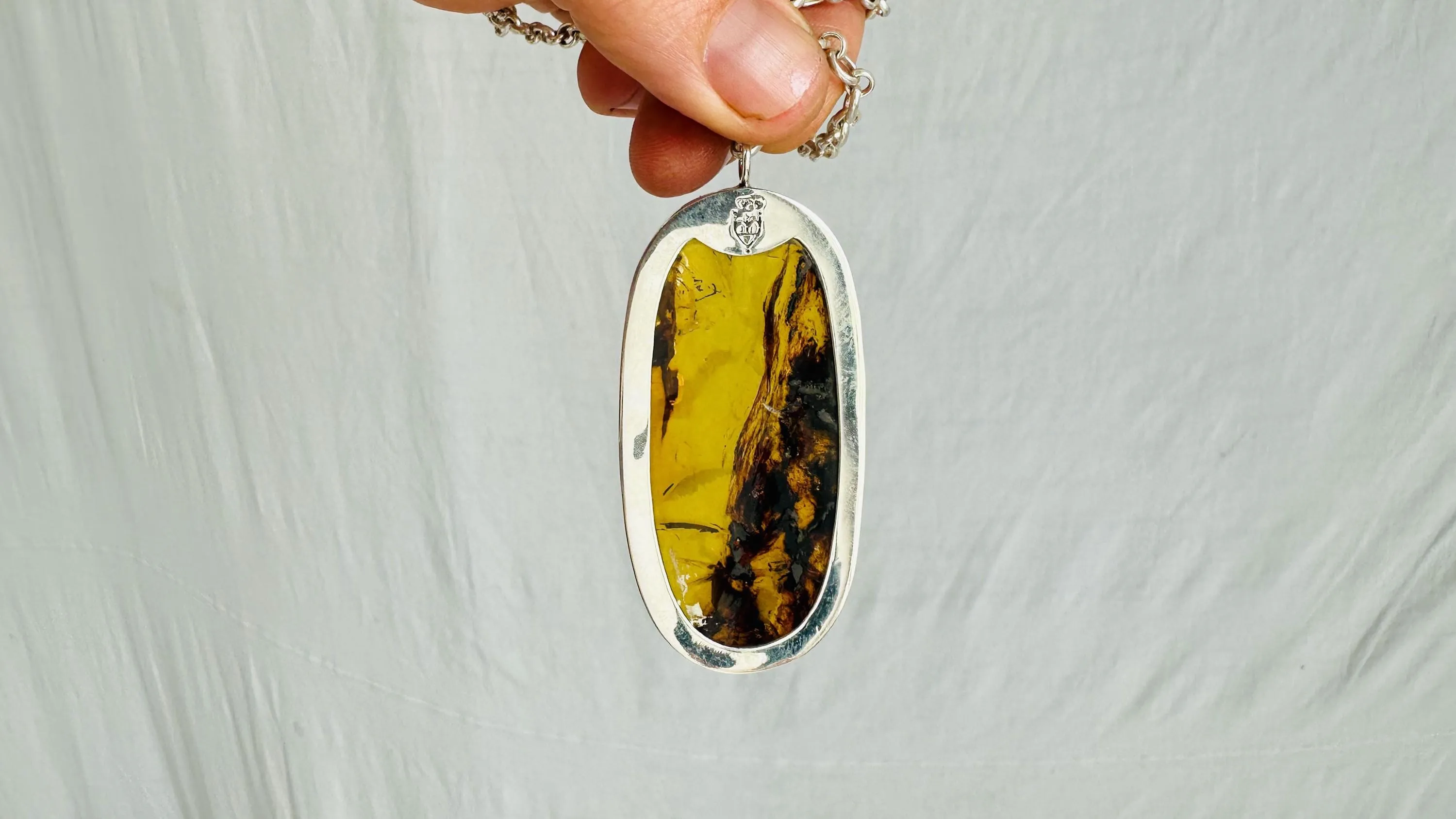 Large Amber Pendant on a Silver Chain. 2622