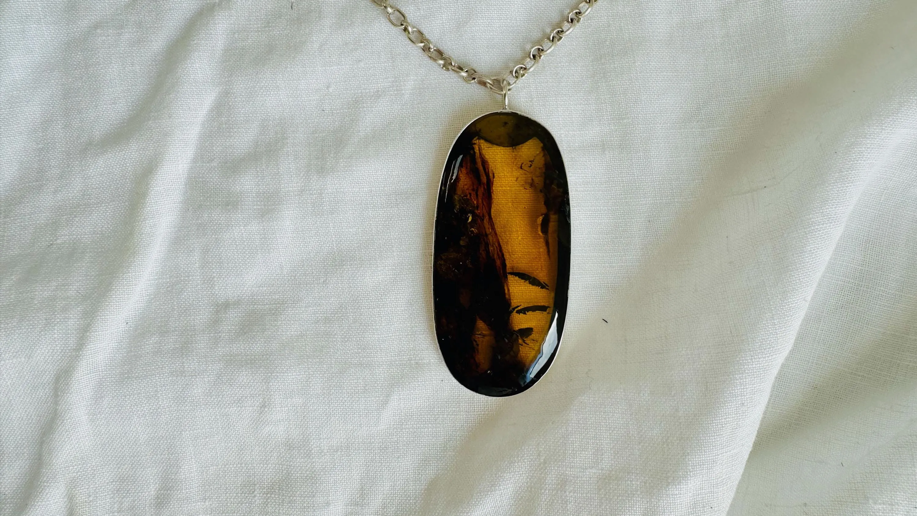 Large Amber Pendant on a Silver Chain. 2622