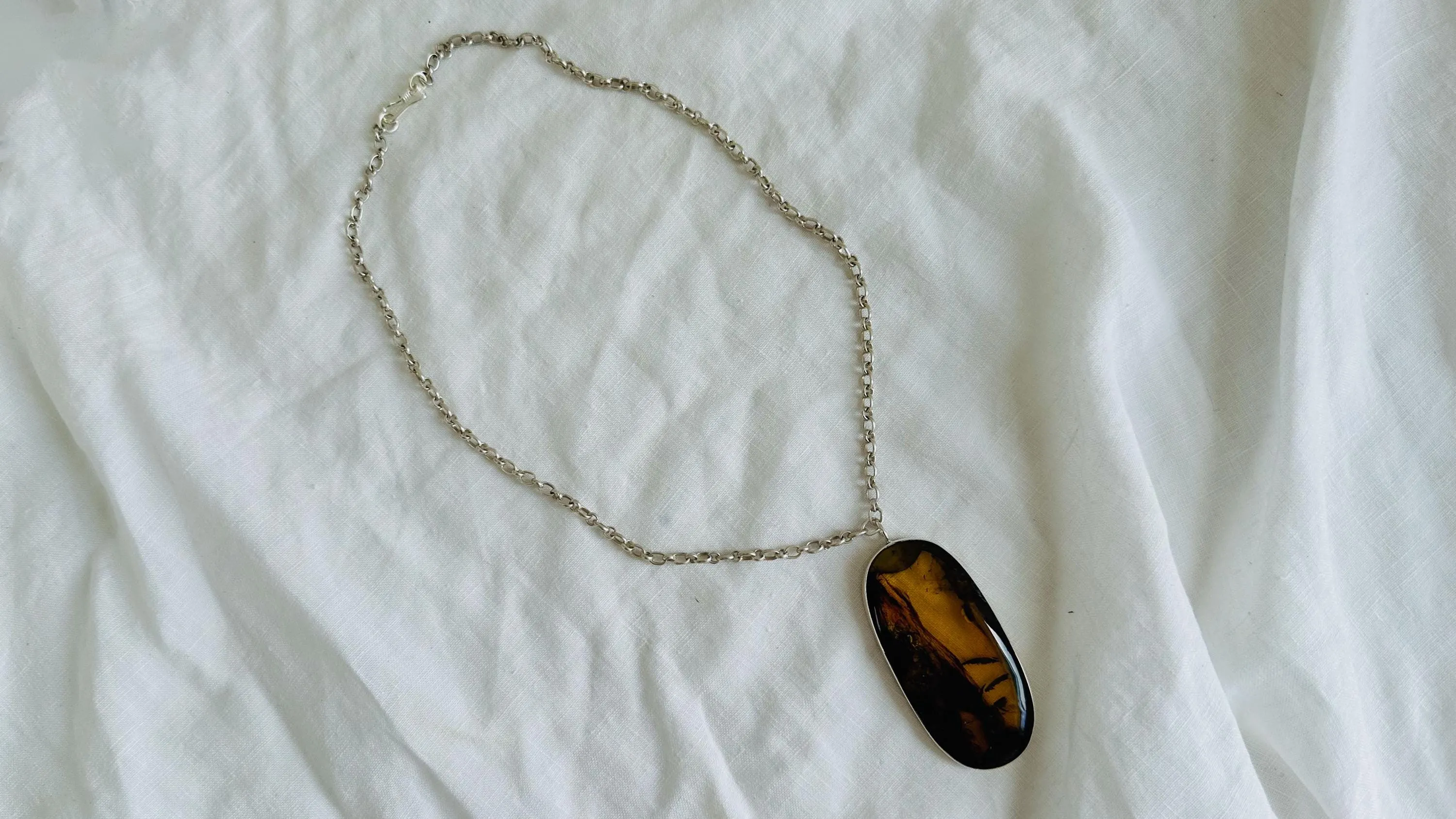 Large Amber Pendant on a Silver Chain. 2622