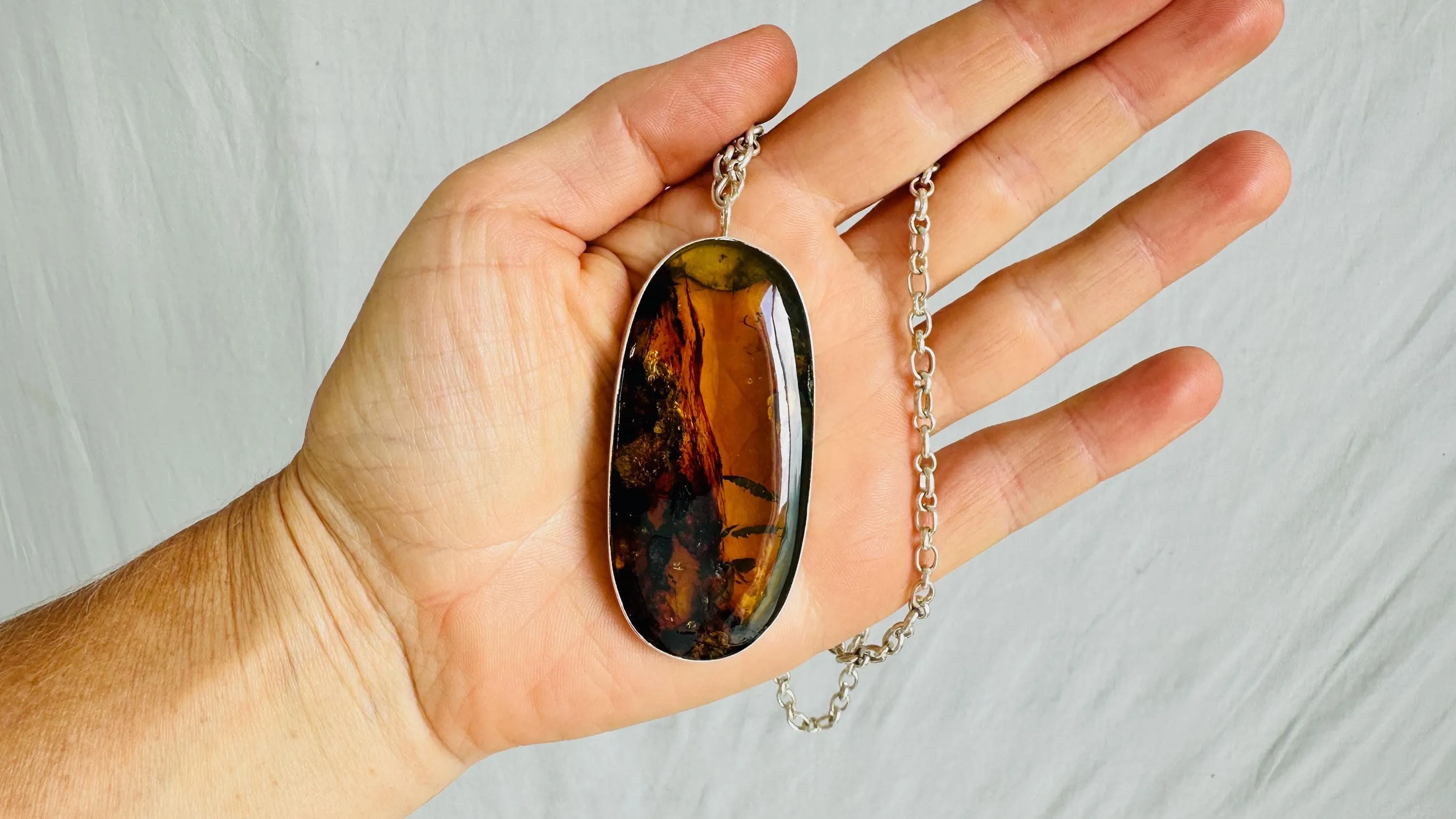 Large Amber Pendant on a Silver Chain. 2622