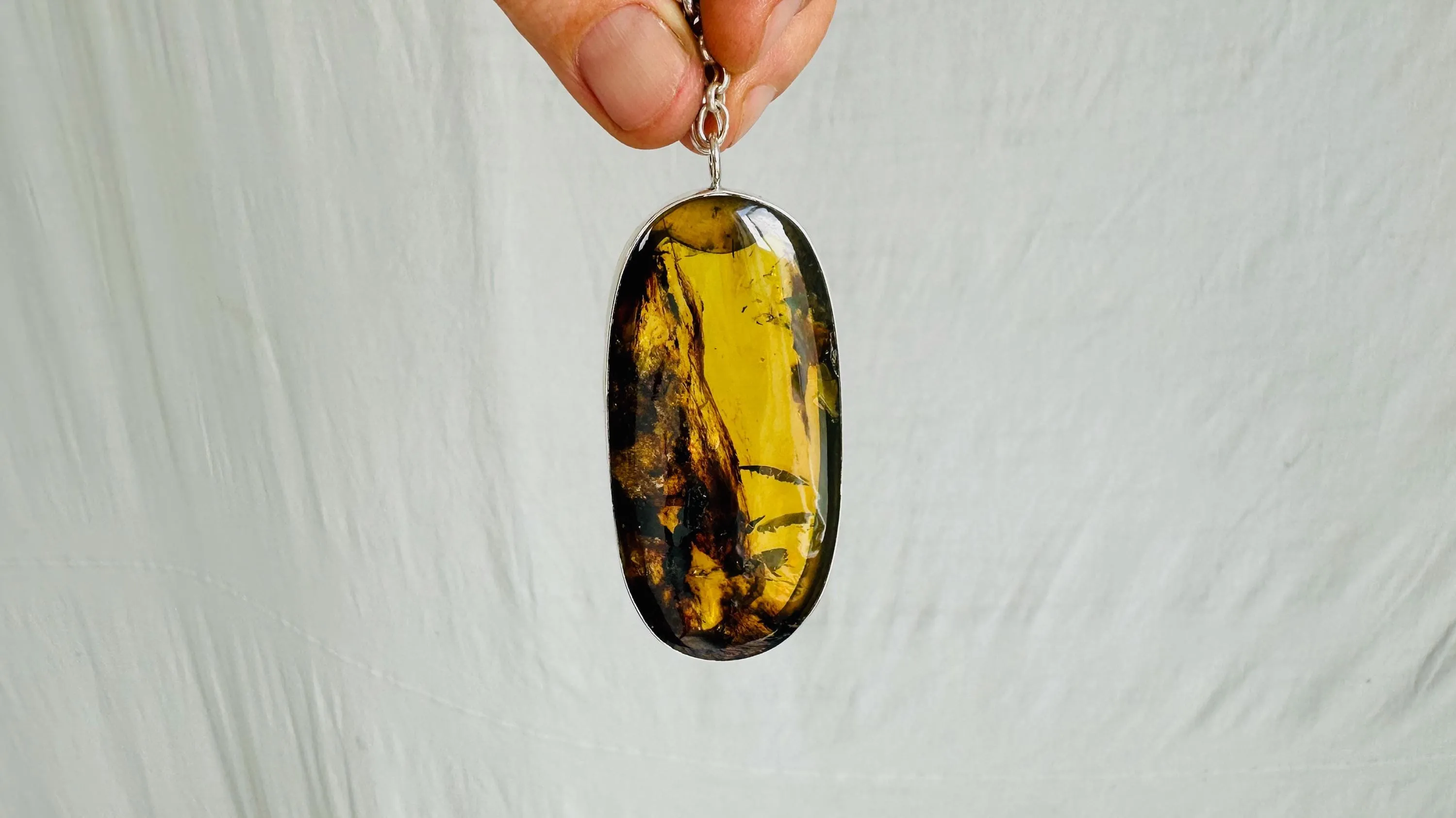 Large Amber Pendant on a Silver Chain. 2622
